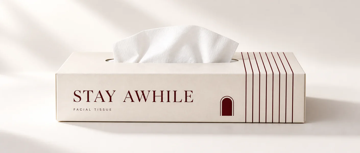 Original Stay Awhile packaging concept: a cream and burgundy facial tissue box with fine stripes and an oval dispensing opening